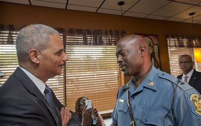 Who's the Man? - &quot;My man! You are the man!&quot; Holder said upon meeting Missouri Highway Patrol Captain Ron Johnson.(Photo: AP Photo/Pablo Martinez Monsivais, Pool)