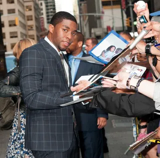 Chadwick Boseman Shows Love - Chadwick Boseman signs autographs for fans outside of the Ed Sullivan Theater before heading inside for an interview on the Late Show With David Letterman in NYC.(Photo: Janet Mayer / Splash News)