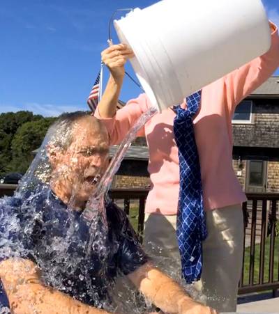All for a Good Cause - Obama has opted out of taking the viral ice bucket challenge to raise money for ALS research, but former President George W. Bush had no such luck. &quot;I'm simply going to write you a check,&quot; Bush said, just before wife Laura dumped the bucket over his head. Now the question is what will Bill Clinton, who was tagged by Bush, do?  (Photo: AP Photo/Courtesy George W. Bush Presidential Center)