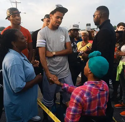 J. Cole - The Roc Nation artist also made a trip down to Ferguson in the wake of the tragedy to stand with the peaceful protesters and remember Michael Brown. He described the atmosphere he experienced as &quot;a beautiful thing...everything is love.&quot; The singer also released a song called &quot;Be Free&quot; days after Brown's death, dedicated to every Black man murdered in America.  (Photo: cruzxctrl via Instagram)