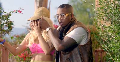 Nas - In her signature blonde locks and pink lipstick, Nicki poured out her heart to Nas in the video for her hit single “By My Side.” Nas spoiled The Head-Barbz-In-Charge who played his main squeeze in the visuals. He even put a ring on it. But the highlight came when Nas and Nicki shared an intimate tongue–down towards the end of their love story.(Photo: Cash Money Records, Universal Republic)