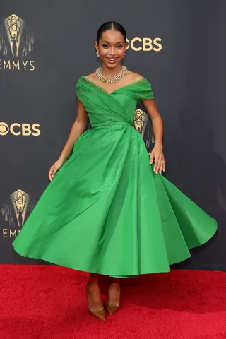 Yara Shahidi - “Grownish” star Yara Shahidi gave us Tinkerbell realness in a classic green off the shoulder pocketed dress by Christian Dior. She accessorized the look with a chunky gold necklace and earrings.&nbsp; (Photo by Rich Fury/Getty Images)