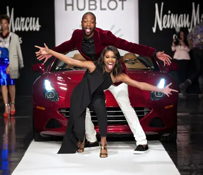 The Couple That Plays Together - Gabrielle Union and Dwyane Wade&nbsp;are having a blast on the runway at the &quot;A Night on the Runwade&quot; fundraising event at Ice Palace Film Studios in Miami.(Photo: Bobby Metelus/Getty Images)