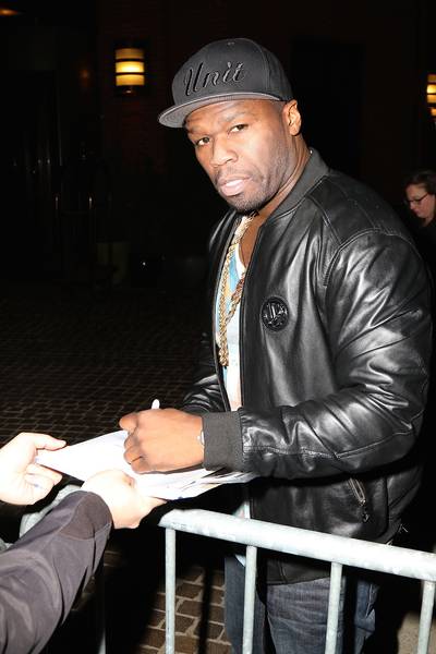 Fan-tastic - 50 Cent signs autographs for fans outside the Tribeca Grand hotel in NYC, where he attended a private movie screening along with Jennifer Aniston.&nbsp;(Photo: We Dem Boyz / Splash News)