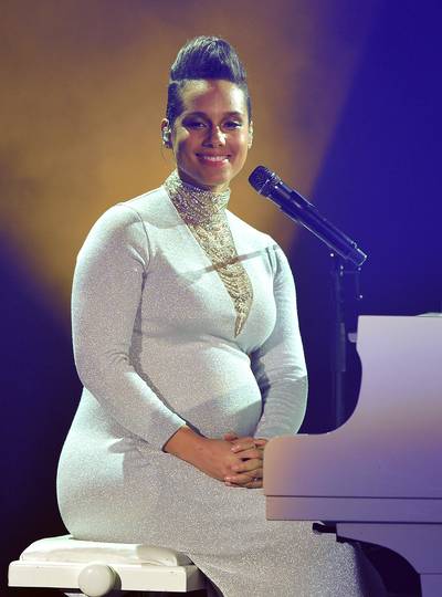 Alicia Keys - For most people, pregnancy means nine months of kicking up your cankles and cracking open pints of ice cream. But not if you're a celebrity. Superstar moms-to-be keep up their busy schedules well into the third trimester.&nbsp;Jaws dropped when a six-month pregnant Keys jumped on a piano during her tribute to&nbsp;Prince&nbsp;during the 2010 BET Awards. For the second time around, the singer is still keeping it moving. With a new children's book titled The Journals of Mama Mae &amp; Lee Lee set to release soon, Keys is heavily promoting and isn't worried that she's eight months along.(Photo: Shirlaine Forrest/Getty Images for MTV)