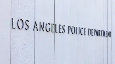 Metal lettering on a wall depicting the headquarters of the Los Angeles Police Department.