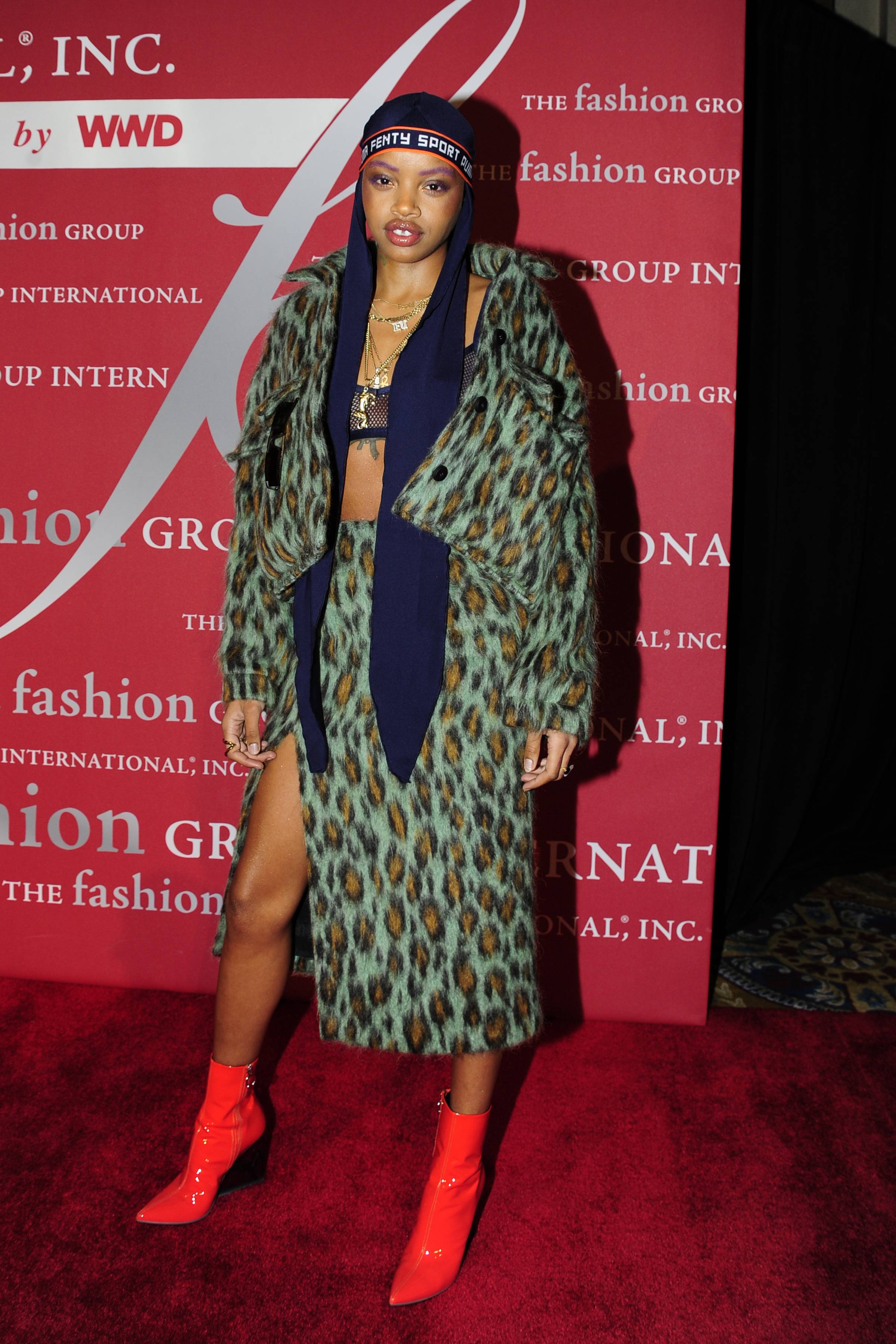 Slick Woods Redefines Mom Looks In Versace Dress Holding Baby Saphir