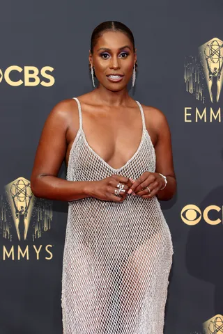 Issa Rae - “Insecure” star Issa Rae glistened in a blinged out Aliette dress by Jason Rembert. She completed the look with even more ice in a platinum grill.&nbsp; (Photo by Rich Fury/Getty Images)
