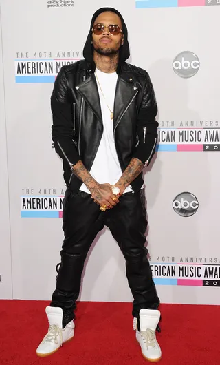 Chris Brown - Brown looked easy breezy in this casual style as he walked the red carpet at the 40th anniversary AMAs.&nbsp; (Photo: Jason Merritt/Getty Images)