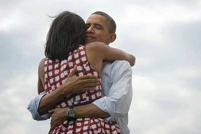 Four More Years - Obama tweeted this photo of an intimate moment with First Lady Michelle Obama with the message, &quot;Four more years.&quot; The tweet went viral within 20 minutes.  (Photo: Scout Tufankjian/Obama for America)