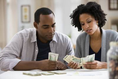/content/dam/betcom/images/2012/11/National-11-01-11-15/111312-national-saving-money-marriage-debt-couple.jpg
