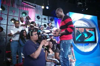 Nice Book - Dwyane Wade's sings his book, "A Father First" at 106 &amp; Park, September 6, 2012. (Photo: John Ricard / BET).