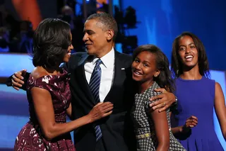 Picture Perfect - President Obama shares an embrace with his family after his acceptance speech. (Photo: Chip Somodevilla/Getty Images)