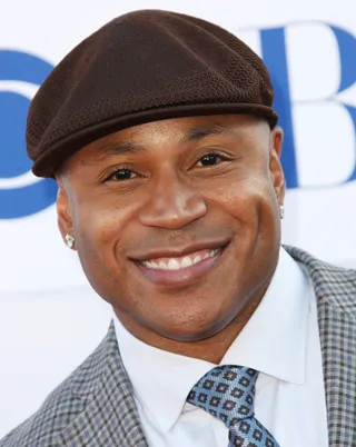 Closing The Gap - Chris played a significant part in shaping LL Cool J's career. He's the reason LL was able to rap "How Easy Is This?" in a Gap commercial, fortifying another rap star's endorsement potential.&nbsp;(Photo: Frederick M. Brown/Getty Images)