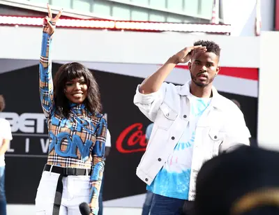 Peace And Salute from Ryan Destiny (L) and Trevor Jackson! - (Photo: Ser Baffo/Getty Images for BET)&nbsp;