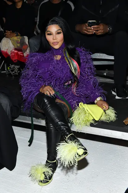 2021: Barclays Center - Lil' - Image 3 from Go Awf, Queen!: Lil' Kim  Styles In A $20K Feathery Mini Dress And Edgy Thigh-High Leather Boots
