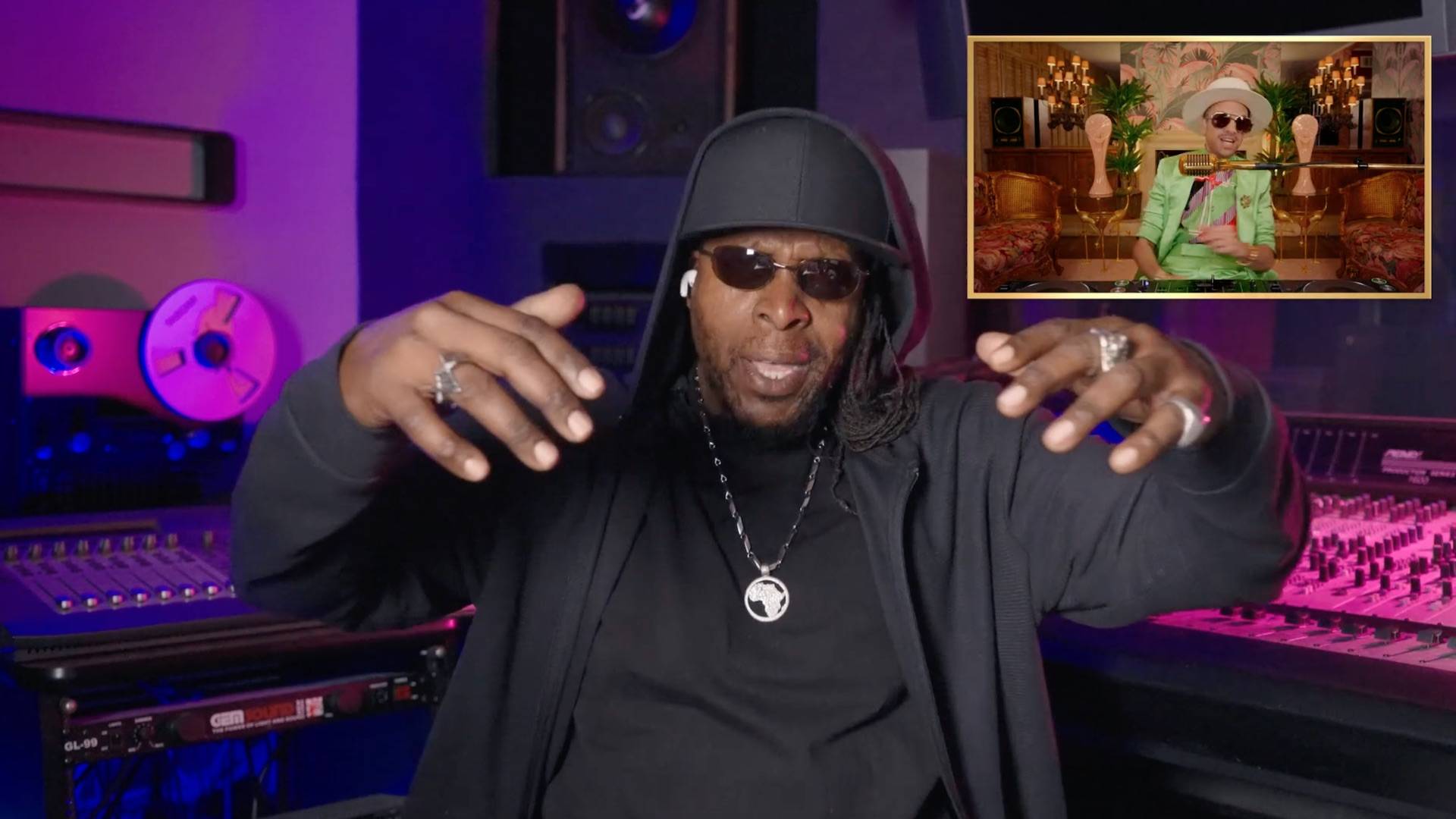 DJ Cassidy welcomes Ini Kamoze to sing "Here Comes the Hotstepper" on DJ Cassidy's Pass The Mic: BET Afterparty 2022.