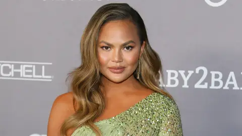 Chrissy Teigen arrives for the 2019 Baby2Baby Fundraising Gala at 3Labs in Culver City, California on Nov. 9, 2019. 