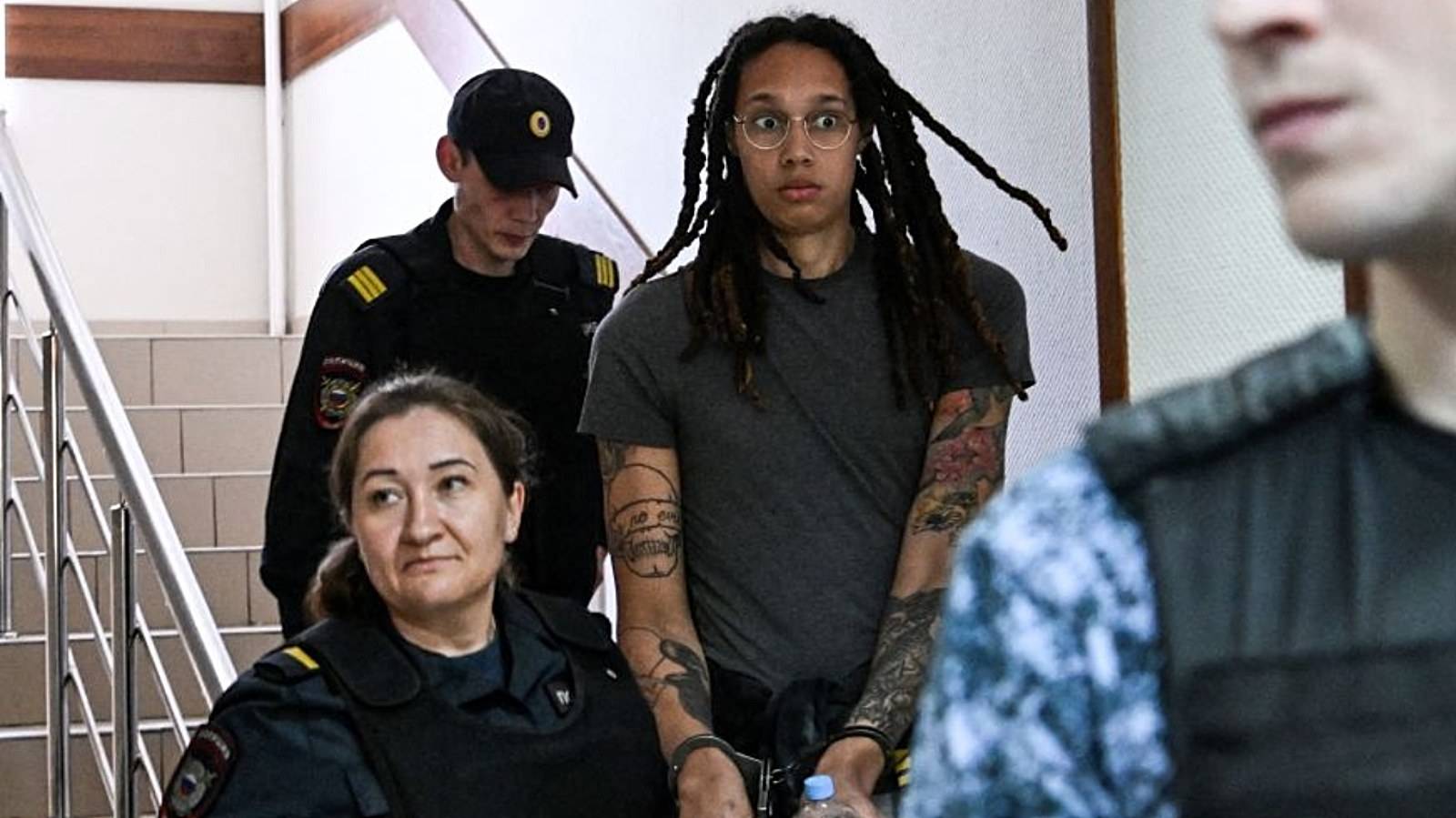 US WNBA basketball superstar Brittney Griner arrives to a hearing at the Khimki Court, outside Moscow on June 27, 2022. - Griner, a two-time Olympic gold medallist and WNBA champion, was detained at Moscow airport in February on charges of carrying in her luggage vape cartridges with cannabis oil, which could carry a 10-year prison sentence.   