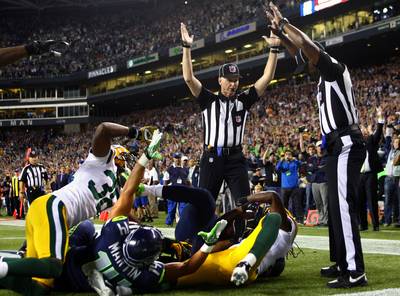 Crying Foul - Monday's match between the Green Bay Packers and Seattle Seahawks came down to a 24-yard catch made by Seahawks wide receiver Golden Tate — or was it an interception by a Green Bay defender?&nbsp;The incident is newest in this season's string of contested calls made by replacement referees, who are filling in because the NFL locked out its official refs in June after their contract expired.&nbsp;While two refs disagreed on the touchdown last night, the Seahawks were ultimately awarded the 14-12 win, a decision also upheld by the NFL on Tuesday, spurring the ire of NFL players and fans on Twitter.&nbsp;—Britt Middleton &nbsp; (Photo: AP Photo/seattlepi.com, Joshua Trujillo)