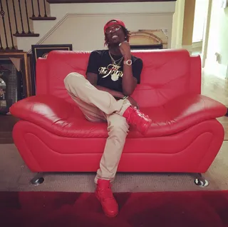 Laid Up - "You can sit back with your feet laid up.In the penthouse suite, you ain't gotta worry 'bout shit.I'mma go out, get the dough, after that, get some more to make sure that you ain't worried 'bout s**t." — "Worried Bout S**t"(Photo: Rich Homie Quan via Instagram)