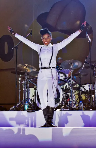 Janelle Monáe - The singer brings her fashion A-game to the 25th Annual Peach Drop in Atlanta with this sleek twist to her signature black-and-white ensemble.&nbsp;   (Photo: Timothy Hiatt/Getty Images for M&amp;M'S)