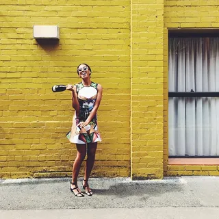 Solange @saintrecords - Solange visited Tasmania for the New Year in a cute printed dress with a bottle of champagne in tow.(Photo: Solange via Instagram)