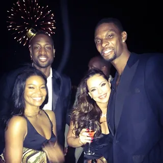 Adrienne Bosh @mrsadriennebosh - “Bringing in the New Year with this beautiful couple for the past 4 years in a row💗 @chrisbosh&nbsp;@gabunion @dwyanewade #Fireworks #Bimini #ThanksResortWorld“The NBA couples ring in yet another New Year together looking good. It was year a to remember for baller Dwyane Wade and actress Gabrielle Union who recently got engaged.(Photo: Adrienne Bosh via Instagram)