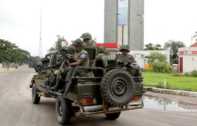 Congo's Army Kills Dozens in Capital - The Congolese army killed&nbsp;dozens of armed youth&nbsp;who attacked the capital of Kinshasa on Monday. An airport, military barracks and television headquarters were reported threatened. Pastor Paul Joseph Mukungubila, a former presidential candidate, says the violence was brought on by ongoing harassment of his supporters.&nbsp;(Photo: Jean Robert N'Kengo/REUTERS /STRINGER /LANDOV)