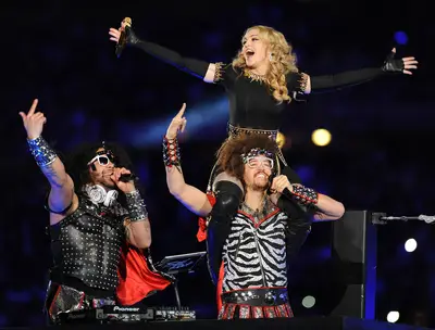 Halftime Mash-Up - LMFAO performs their &quot;Party Rock Anthem&quot; with Madonna during the lavish intermission show.(Photo: Frank Micelotta/PictureGroup)