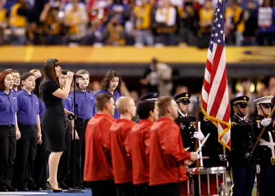 Star-Spangled Voice - Kelly Clarkson performed the national anthem at Lucas Oil Stadium. She remembered all the words. (Photo: Rob Carr/Getty Images)