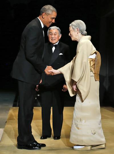 A State Dinner - Later on Thursday, Japanese Emperor Akihito (center) and Empress Michiko (right) welcomed the president at a State Dinner at the Imperial Palace in Tokyo.&nbsp;(Photo: AP Photo/Charles Dharapak)
