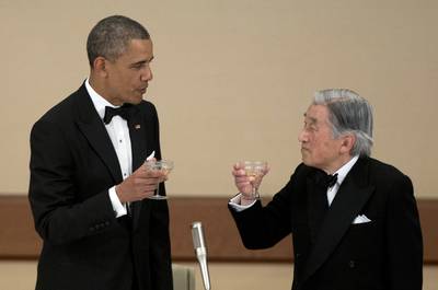 Raise Your Glass - President Barack Obama and Emperor Akihito raised their glasses in a toast during the state dinner.(Photo: AP Photo/Carolyn Kaster)