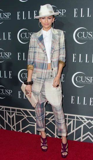 Suit Up - Our girl makes the menswear trend her own in a plaid Vivienne Westwood suit and H. Lorenzo cropped shirt, adding Ruthie Davis booties and a sharp fedora for extra flair.&nbsp;  (Photo: Valerie Macon/Getty Images)