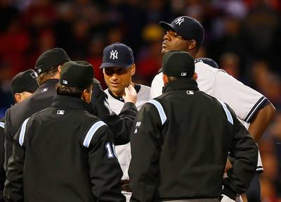 Pineda Caught With Foreign Substance Again - A dose of déjà vu? Less than two weeks after getting away with having a foreign substance on the palm of his right hand against Boston, New York Yankees pitcher Michael Pineda was ejected Wednesday night for once again having pine tar on his body. This time the 25-year-old hurler had the pine tar on his neck and was tossed during the second inning of a Yankees 5-1 road loss to the Red Sox. Some sort of suspension is likely to follow. Yankees general manager Brian Cashman told CBS Sports he was “embarrassed” and Yanks manager Joe Girardi called Pineda’s actions “poor judgment.” Pineda himself said he was sad.&nbsp;(Photo: Jared Wickerham/Getty Images)
