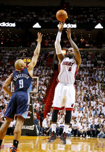 King James Leads Heat Past Bobcats - LeBron James had 32 points and eight assists while Chris Bosh added 20 points to lead Miami to a 101-97 victory over the Charlotte Bobcats on Wednesday night, giving the defending champion Heat a commanding 2-0 lead in their first-round playoff series.&nbsp;(Photo: Mike Ehrmann/Getty Images)