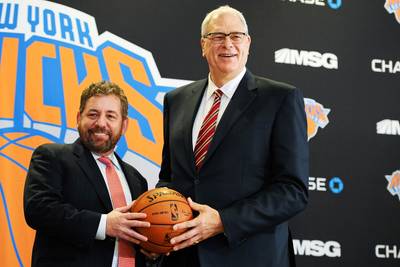 Knicks Owner Tries to Stop Phil Jackson's Firings - Last month, New York Knicks' owner James Dolan vowed that he was &quot;willingly and gratefully&quot; giving up control of all basketball decisions to newly hired team president Phil Jackson. Did you really believe him? Dolan already seems to be opposing the decisions of the legendary basketball coach. A team source told the New York Daily News&nbsp;that Dolan has opposed Jackson's Monday decision of firing the Knicks' entire coaching staff. Reportedly, Dolan is taking offense to the removal of certain employees.(Photo: Maddie Meyer/Getty Images)