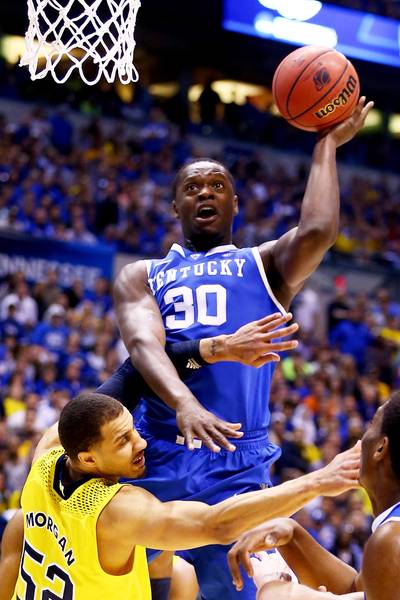 Kentucky's Julius Randle Enters NBA Draft - Another Kentucky Wildcats freshman is entering the 2014 NBA Draft. Days after James Young entered the draft, Julius Randle announced Tuesday that he is going pro as well. The 6-foot-9 forward averaged 15 points and 10 rebounds per game this season with 24 double-doubles.&nbsp;(Photo: Andy Lyons/Getty Images)