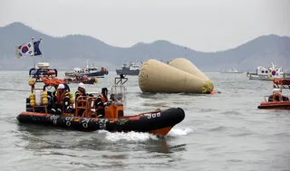 Captain of Sunken South Korean Ferry Arrested - More than 300 people are missing or dead after a ferry sank off South Korea. The captain of the vessel and two crew members were arrested on suspicion of negligence and abandoning people. President Park Geun-hye is likening the crew members’ actions to murder.&nbsp;(Photo: AP Photo/Lee Jin-man)