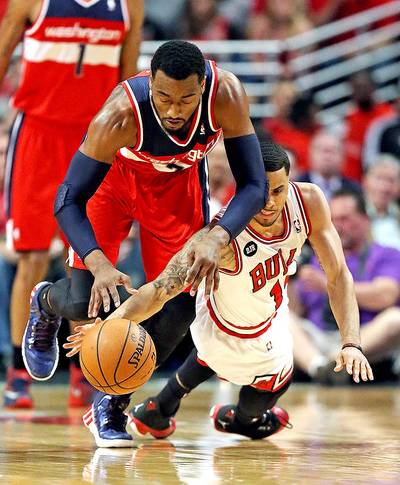 Wizards Rally to Defeat Chicago Bulls - Down 13 points, Nene Hilario helped power a Washington Wizards rally that led to a 102-93 road win over the Chicago Bulls yesterday. Nene scored 24 points and Trevor Ariza added 18 for the Wizards.(Photo: Jonathan Daniel/Getty Images)
