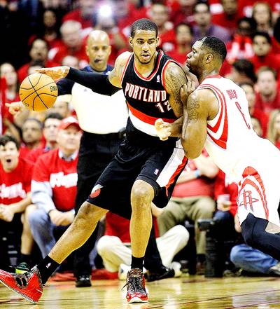 Trail Blazers Edge Houston Rockets in Overtime - LaMarcus Aldridge and Damian Lillard did what stars are supposed to do in the playoffs — will their team to victory. Aldridge scored 46 points and Lillard added 31 points, including a decisive pair of free throws in overtime, to lift the Portland Trail Blazers to a 122-120 road win over the Houston Rockets in game one of their first-round series on Sunday.&nbsp;(Photo: Bob Levey/Getty Images)