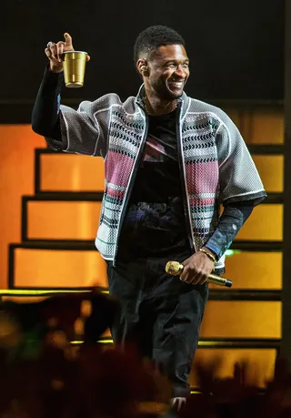 Yeah! - Usher also joined Pharrell's final set. He belted out his P-written &quot;U Don't Have to Call.&quot;&nbsp;(Photo: Christopher Polk/Getty Images for Coachella)