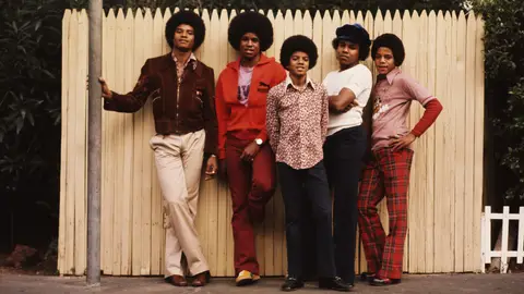The Jackson brothers pose for a portrait in the backyard of their home, Los Angeles, 1972. From left to right, Jackie Jackson, Jermaine Jackson, Michael Jackson (1958 - 2009), Tito Jackson and Marlon Jackson. (Photo by Michael Ochs Archives/Getty Images)