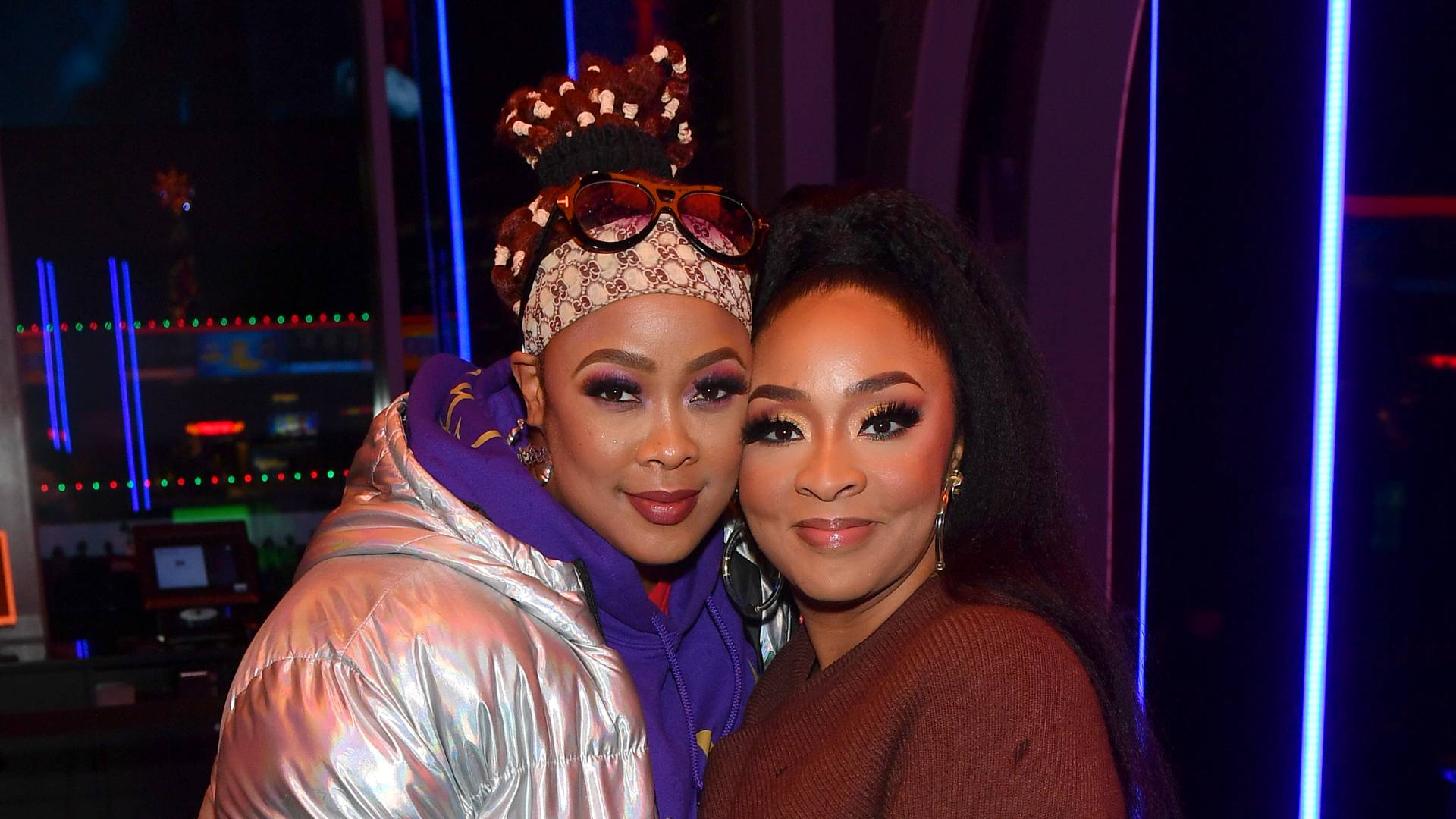 DaBrat and Jesseca Dupart attend the Atlanta screening of "I Wanna Dance With Somebody" at Regal Atlantic Station on December 14, 2022 in Atlanta, Georgia. 