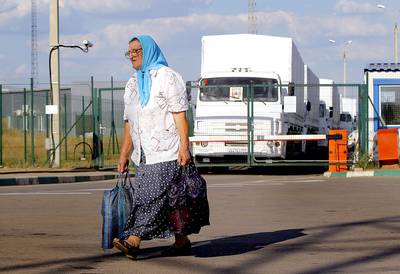 Refugees - The UN reported on Aug. 5 that more than 1,000 civilians were fleeing the conflict zone every day. Since ?many Ukrainians left their homes without officially registering with the Ukrainian authorities or not addressing them directly,? the numbers are likely undercounted.(Photo: Sergei Grits/AP Photo)
