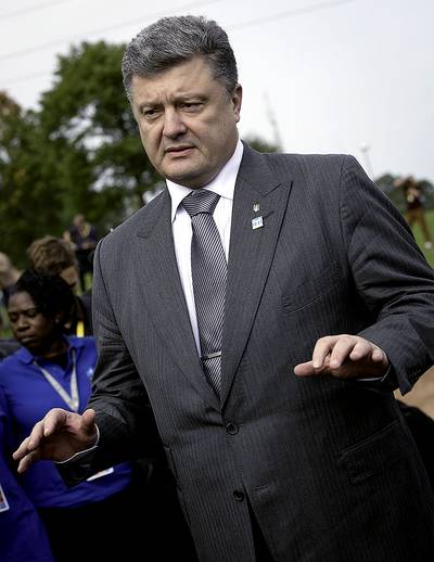 A Partnership Agreement - The EU signed a partnership pact with Ukraine, Moldova and Georgia, binding the three nations closer to the West both economically and politically, BBC reported. Russia strongly opposed the agreement, while Poroshenko called the day the most important day in Ukraine?s history since its independence. (Photo: Virginia Mayo/AP Photo)