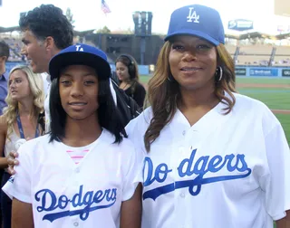 Girl Power - Mo'ne Davis&nbsp;poses with&nbsp;Queen Latifah just before Davis threw the first pitch at the LA Dodgers versus the Washington Nationals game at Dodger Stadium in Los Angeles.(Photo: London Ent / Splash News)