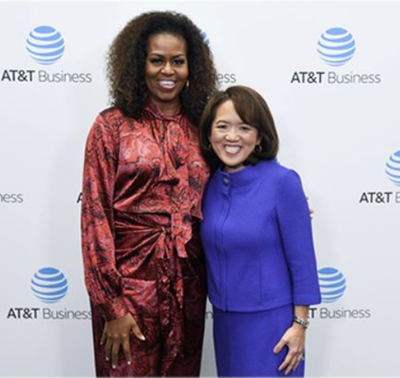 Natural Beauty! - Michelle Obama attended Anne Chow Show for a fireside chat with Anne Chow on December 10, 2019 in Dallas, Texas. She looked stunning with natural curls wearing a red multi-color silk dress by Ganni. Our fovever flotus is always serving the best style!&nbsp; (Photo Courtesy of AT&T Business)