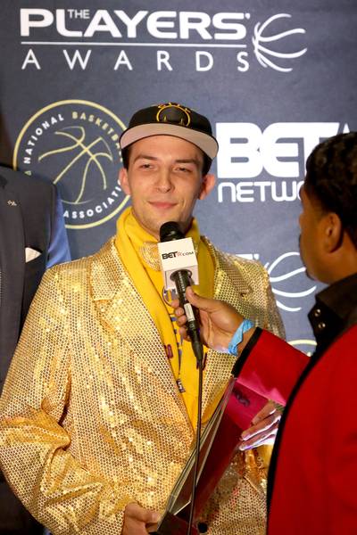 Fan Fest - Golden State Warriors can't keep him away! He's a die-hard fan, from his hat to his shoes, he's rocking every piece of gold he could find. (Photo: Gabe Ginsberg/BET/Getty Images for BET)
