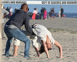 Jamie Foxx and Katie Holmes - Jamie Foxx and Katie Holmes were looking real cozy on the beach. This on-again, off-again couple of five years were looking drunk in love on the beach in Malibu. Katie even showed off some of her gymnastics skills with the help of her boo Jamie. (Photo: The Mega Agency)